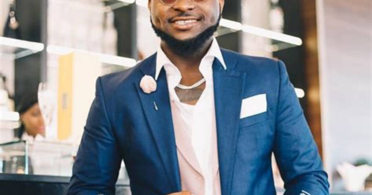 Davido Names Nigerian Business Magnate Captain Idahosa Wells Okunbo as His Godfather (Photo)