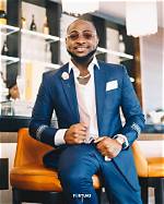 Davido Names Nigerian Business Magnate Captain Idahosa Wells Okunbo as His Godfather (Photo)