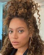 Is Her Hair Real? New Look and Tattoo