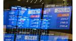 Markets Mixed as Traders Weigh Rates Outlook