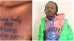Naira Marley Rendered Speechless Again as Die-Hard Female Fan Tattoos His Name on Her Chest