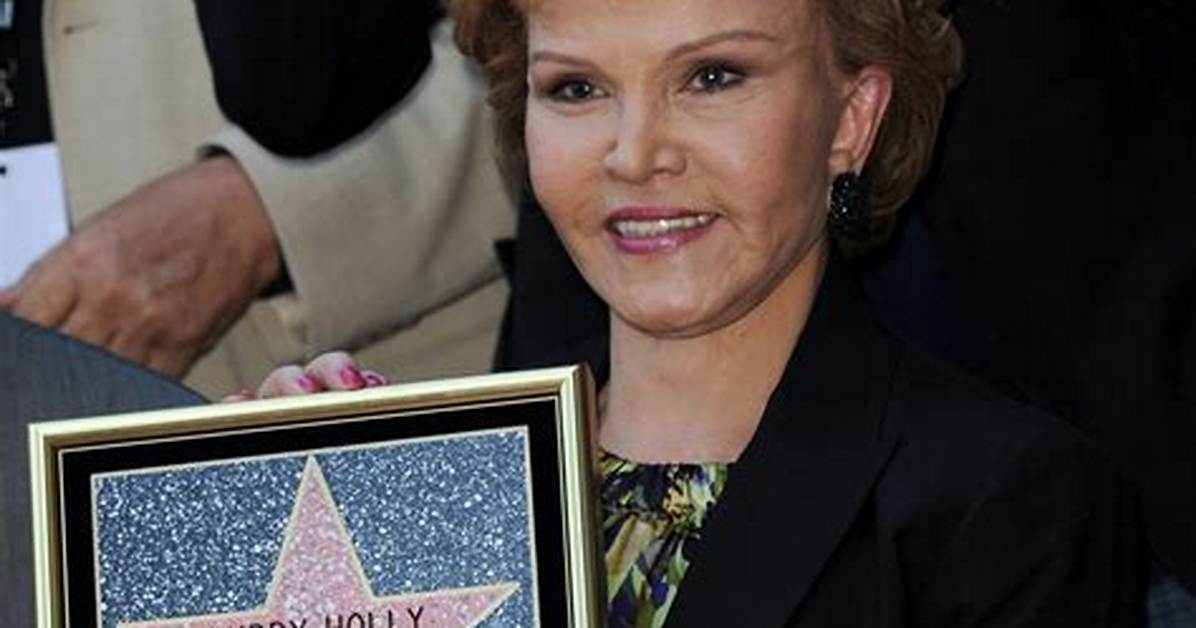 Who Is Maria Elena Holly? Wiki, Height, Husband, Net Worth