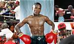 Young African Millionaire Imitates Floyd Mayweather by Flaunting Wads of Cash Online